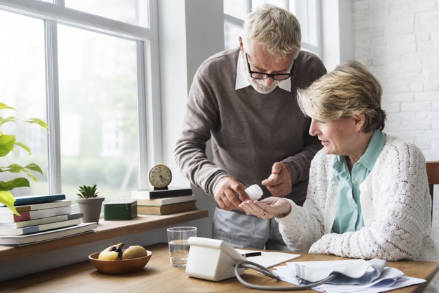 old couple researching medicare